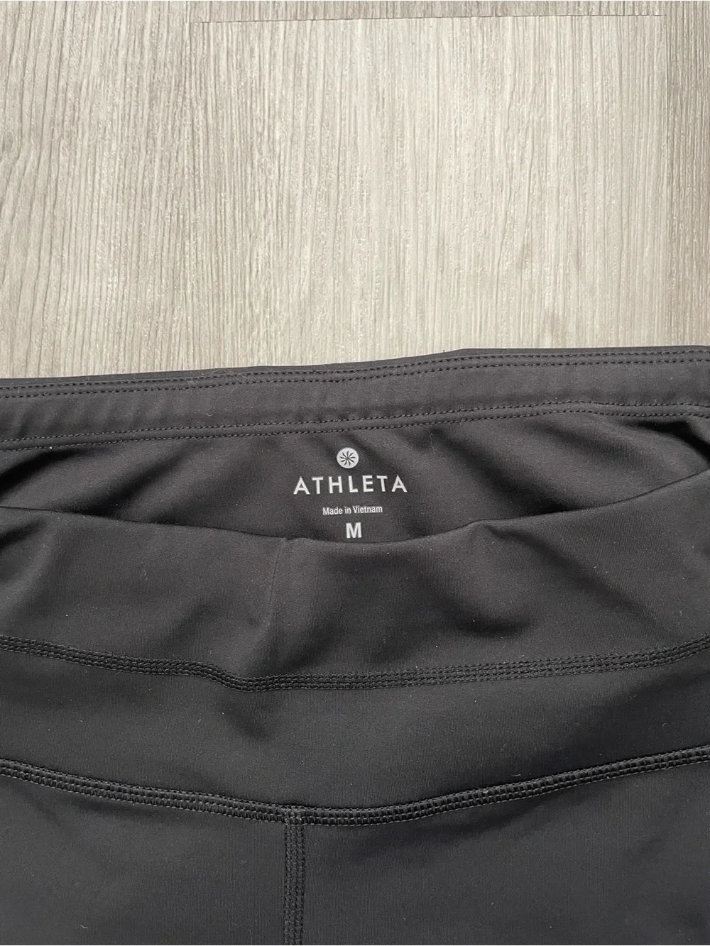 Athleta 1 black&grey camo ,capri and 2 black seize M plus 2 tank top M